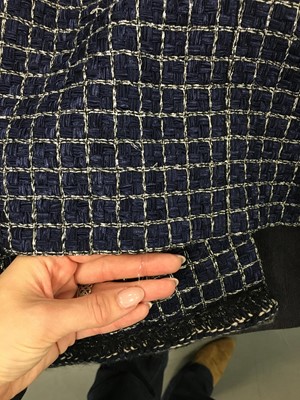 Lot 1 - A fine Chanel by Karl Lagerfeld fantasy tweed checked coat, 'Paris Cosmopolite' collection, Metiers d'Art, Pre-Fall 2017