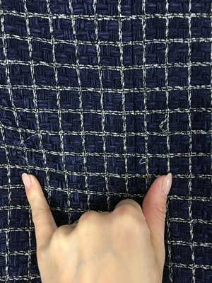 Lot 1 - A fine Chanel by Karl Lagerfeld fantasy tweed checked coat, 'Paris Cosmopolite' collection, Metiers d'Art, Pre-Fall 2017