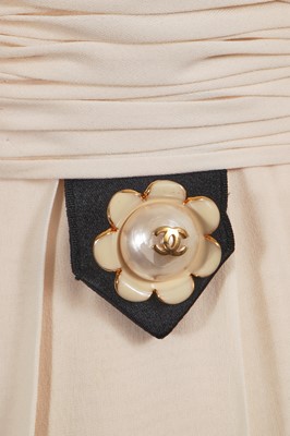 Lot 234 - A Chanel by Karl Lagerfeld cream silk chiffon dress, circa 1991