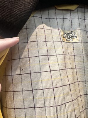 Lot 156 - An Hermès men's yellow cotton raincoat, 1970s