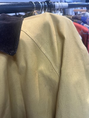 Lot 156 - An Hermès men's yellow cotton raincoat, 1970s