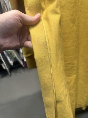 Lot 156 - An Hermès men's yellow cotton raincoat, 1970s