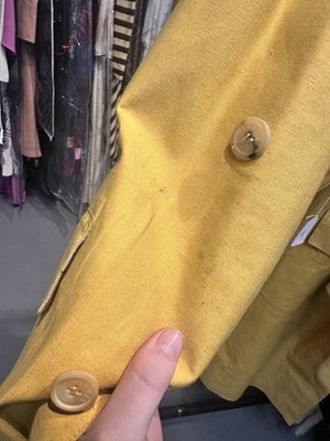 Lot 156 - An Hermès men's yellow cotton raincoat, 1970s