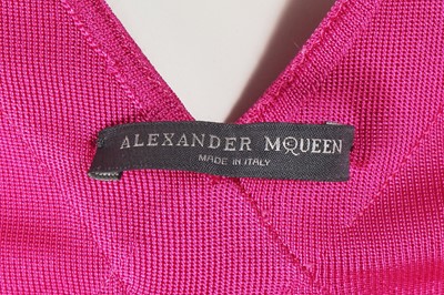Lot 320 - An Alexander McQueen pink silk jersey dress, circa 2010