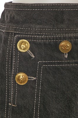 Lot 231 - A Chanel by Karl Lagerfeld black denim mini skirt, circa 1995