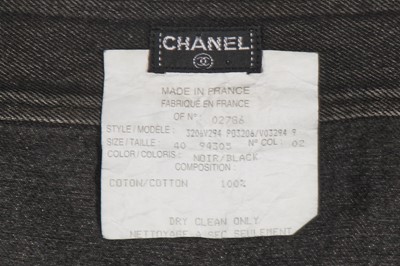 Lot 231 - A Chanel by Karl Lagerfeld black denim mini skirt, circa 1995