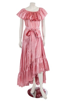 Lot 633 - An Yves Saint Laurent salmon pink silk evening dress, circa 1980