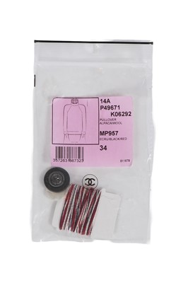 Lot 18 - A Chanel by Karl Lagerfeld knitted alpaca-blend ensemble, 'Paris-Dallas' collection, Métiers d'Art, Pre-Fall 2014