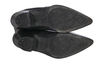 Lot 18 - A Chanel by Karl Lagerfeld knitted alpaca-blend ensemble, 'Paris-Dallas' collection, Métiers d'Art, Pre-Fall 2014