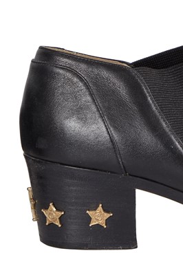 Lot 195 - A pair of Chanel by Karl Lagerfeld black leather boots, 'Paris-Dallas' collection, Métiers d'Art, Pre-Fall 2014