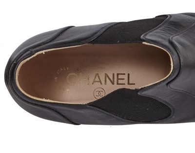 Lot 195 - A pair of Chanel by Karl Lagerfeld black leather boots, 'Paris-Dallas' collection, Métiers d'Art, Pre-Fall 2014