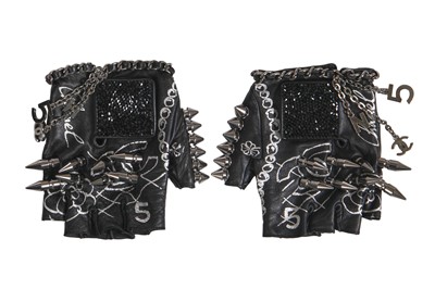 Lot 24 - A pair of Chanel by Karl Lagerfeld little black gloves, 2000s