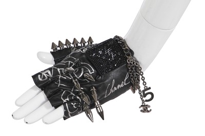 Lot 24 - A pair of Chanel by Karl Lagerfeld little black gloves, 2000s