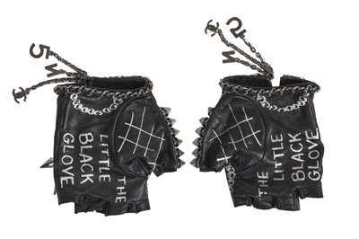 Lot 24 - A pair of Chanel by Karl Lagerfeld little black gloves, 2000s