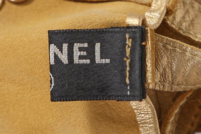 Lot 191 - A group of Chanel by Karl Lagerfeld gold leather accessories, ‘La Modernité de l’Antiquité’ collection, Cruise 2018