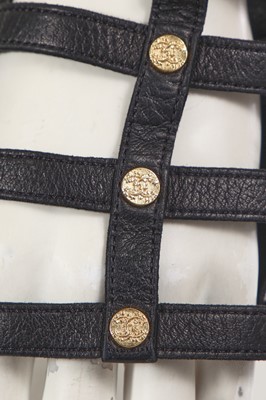 Lot 190 - A Chanel by Karl Lagerfeld blue wool belt and black leather mitts, ‘La Modernité de l’Antiquité’ collection, Cruise 2018