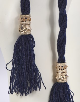 Lot 190 - A Chanel by Karl Lagerfeld blue wool belt and black leather mitts, ‘La Modernité de l’Antiquité’ collection, Cruise 2018