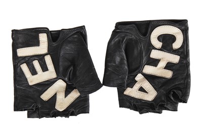 Lot 188 - A pair of Chanel by Karl Lagerfeld black and white lambskin glovelettes, 'Chanel by the Sea' collection, Spring-Summer 2019