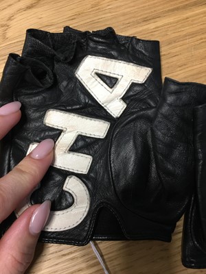 Lot 188 - A pair of Chanel by Karl Lagerfeld black and white lambskin glovelettes, 'Chanel by the Sea' collection, Spring-Summer 2019
