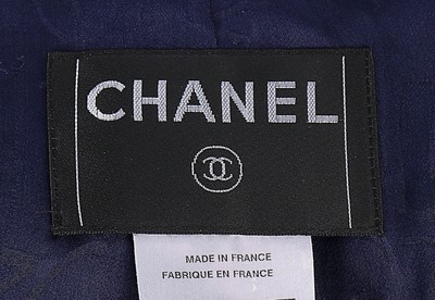 Lot 257 - A Chanel tweed jacket, 1998, labelled and size...