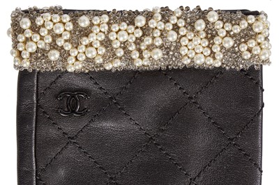 Lot 198 - Two pairs of Chanel by Karl Lagerfeld black quilt-effect lambskin glovelettes, 2000s-2010s