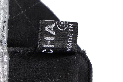 Lot 198 - Two pairs of Chanel by Karl Lagerfeld black quilt-effect lambskin glovelettes, 2000s-2010s