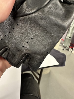 Lot 198 - Two pairs of Chanel by Karl Lagerfeld black quilt-effect lambskin glovelettes, 2000s-2010s