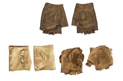 Lot 201 - Three pairs of Chanel by Karl Lagerfeld gold lambskin glovelettes, 2000s-2010s