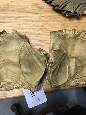 Lot 201 - Three pairs of Chanel by Karl Lagerfeld gold lambskin glovelettes, 2000s-2010s