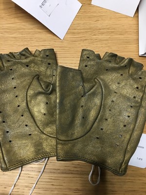 Lot 201 - Three pairs of Chanel by Karl Lagerfeld gold lambskin glovelettes, 2000s-2010s