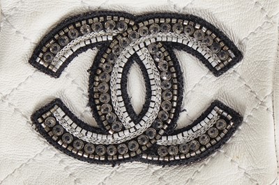 Lot 202 - Two pairs of Chanel by Karl Lagerfeld white lambskin glovelettes, 2000s-2010s
