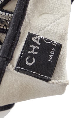 Lot 202 - Two pairs of Chanel by Karl Lagerfeld white lambskin glovelettes, 2000s-2010s