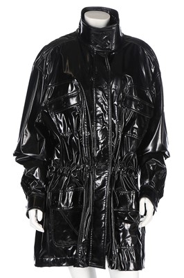 Lot 258 - A Chanel black PVC raincoat, 1997, labelled...