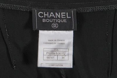 Lot 225 - A Chanel by Karl Lagerfeld black and pink jersey ensemble, 1990s-2000s