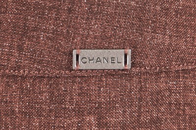 Lot 211 - A Chanel by Karl Lagerfeld pink and brown cotton ensemble, 2000-2002