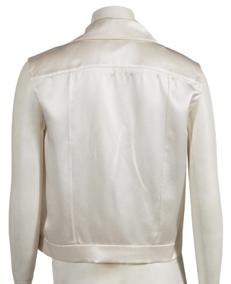 Lot 229 - Two Chanel by Karl Lagerfeld cream silk satin blouses, late 1990s