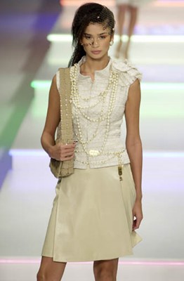 Lot 213 - A Chanel by Karl Lagerfeld cotton-blend tweed waistcoat, Spring-Summer 2001