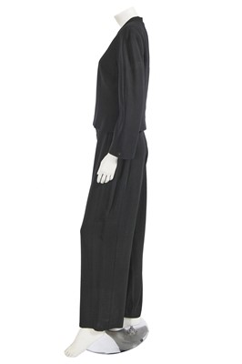 Lot 221 - A Chanel by Karl Lagerfeld black wool-blend crêpe suit, circa 2000