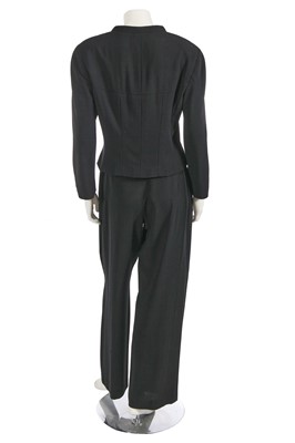 Lot 221 - A Chanel by Karl Lagerfeld black wool-blend crêpe suit, circa 2000