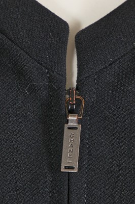Lot 221 - A Chanel by Karl Lagerfeld black wool-blend crêpe suit, circa 2000