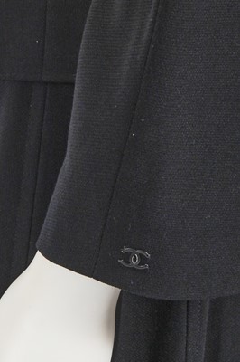 Lot 221 - A Chanel by Karl Lagerfeld black wool-blend crêpe suit, circa 2000