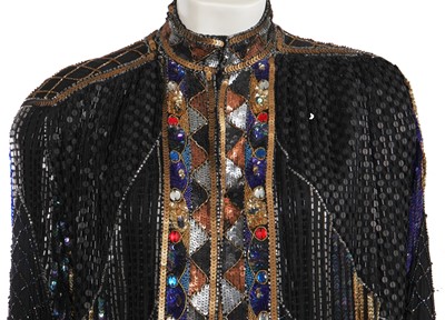 Lot 639 - A group of sequined dresses and blouses, 1980s
