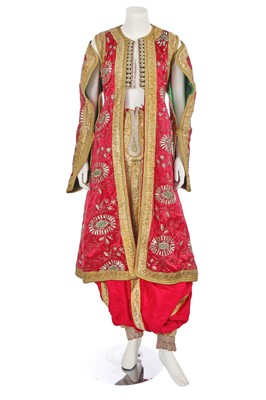 Lot 942 - An Albanian embroidered red and gold wedding ensemble, early 20th century