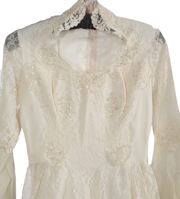 Lot 720 - A large group of wedding dresses, 1950s-1970s