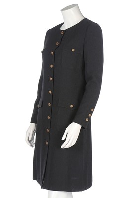 Lot 329 - A Chanel black wool coat/dress, 1996, boutique...