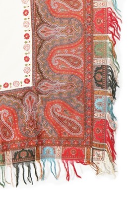 Lot 392 - A woven turnover shawl, probably Paisley, 1850-...