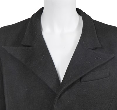 Lot 26 - An Alexander McQueen black Melton wool coat, probably 'Joan' collection Autumn-Winter 1998-99