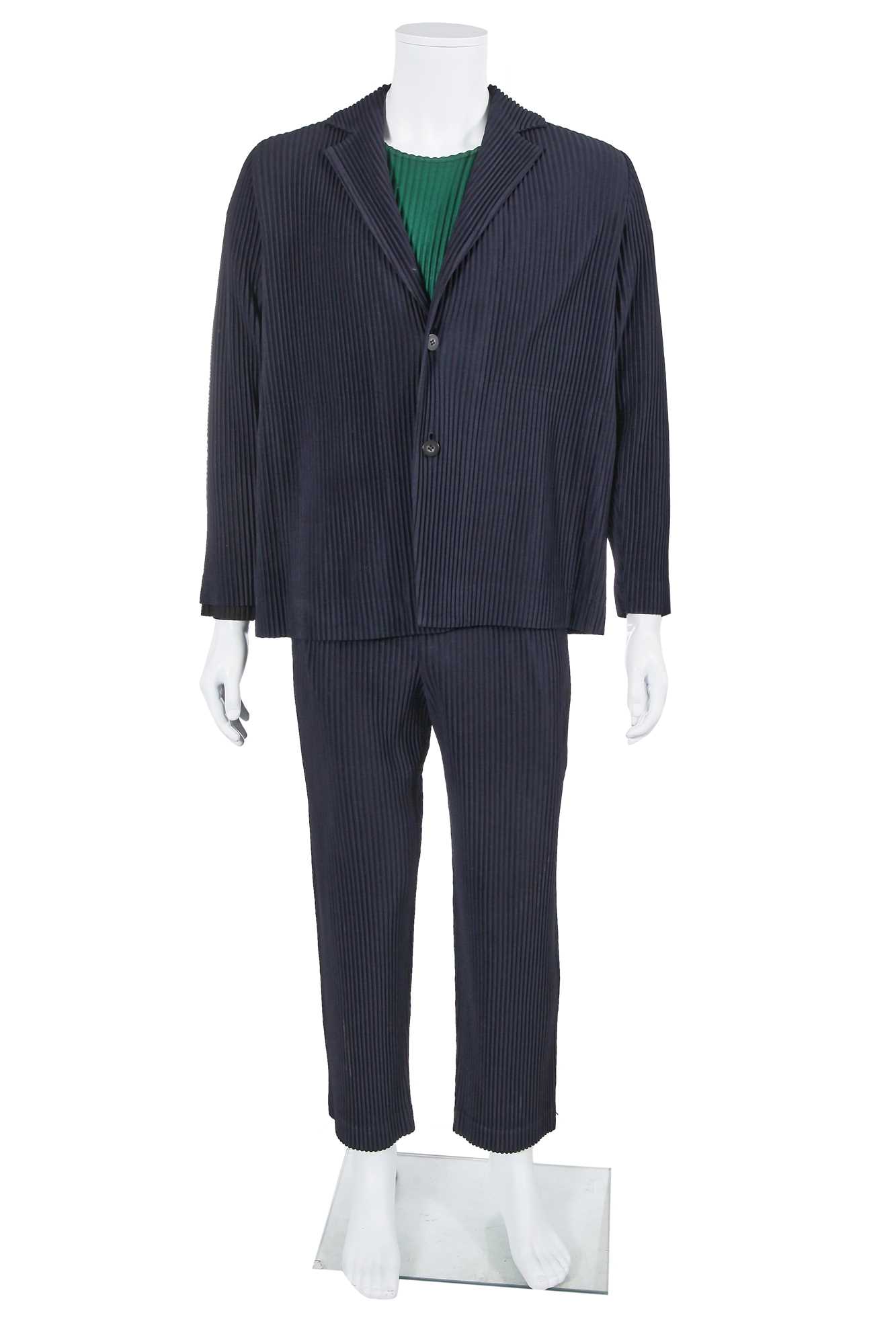 Lot 137 - An Issey Miyake Homme Plissé navy pleated polyester suit, circa 2017