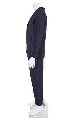 Lot 137 - An Issey Miyake Homme Plissé navy pleated polyester suit, circa 2017