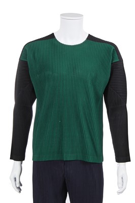 Lot 137 - An Issey Miyake Homme Plissé navy pleated polyester suit, circa 2017